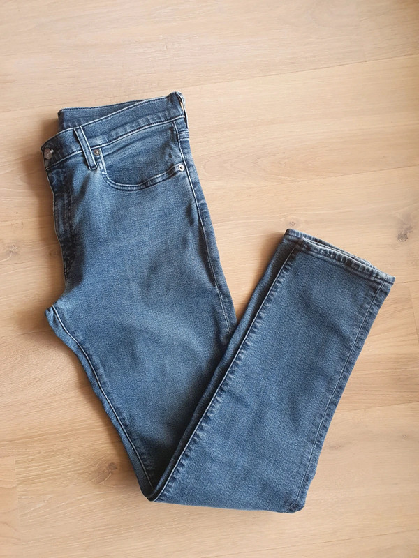 Jeans bleu Levi's coupe slim taper homme 1