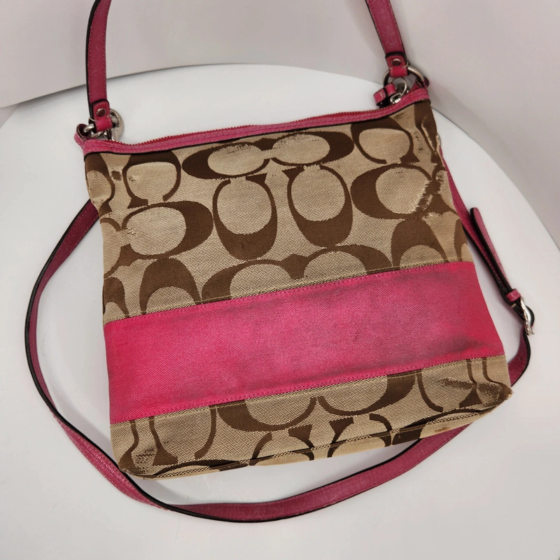 Coach purse with pink trim sales