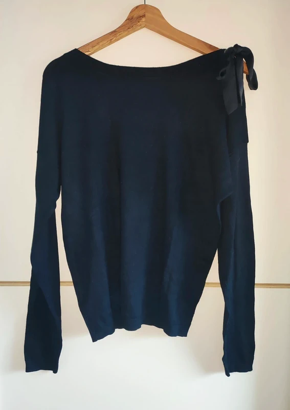 Pull avec nœud sur le côté