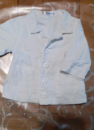 Veste blanche, merk: Kitchoun, staat: Heel goed, maat: Tot 1 maand / 50 cm, € 1,00, € 1,75 inclusief Kopersbescherming