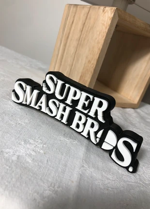Figurine Super smash Bros logo, marca: smash, estado: Bom, tamanho: Tamanho único, €6.00, €7.00 inclui Proteção do Comprador Pro