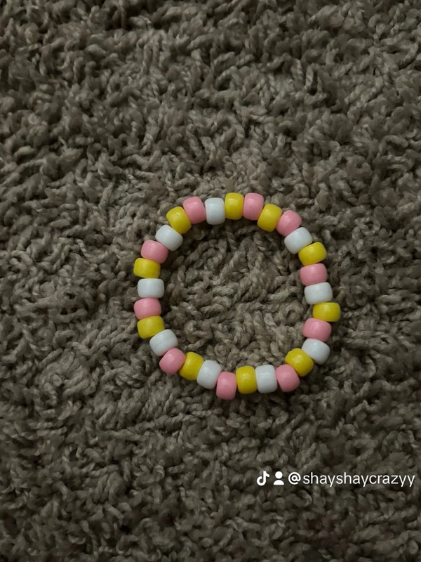 Pink, yellow and white beaded bracelet 2