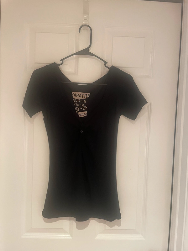 Women's black top. Size Medium. 1