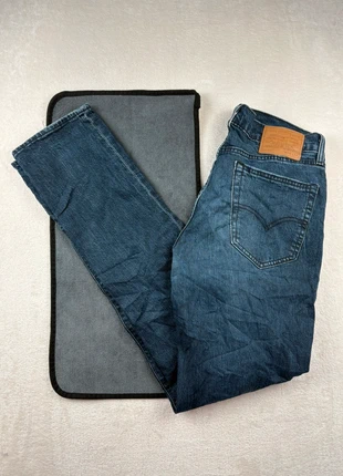 Jeans Lévis 511 Prémium coupe droite patch cuir vintage bleu - w34, merk: Levi's, staat: Heel goed, maat: W34 | FR 44, € 24,90, € 26,85 inclusief Kopersbescherming