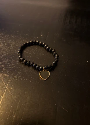 Zwarte armband, staat: Heel goed, € 1,50, € 2,28 inclusief Kopersbescherming