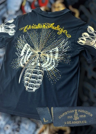 Polo Christian Audigier, brand: Christian Audigier, condizioni: Ottime, taglia: L, €30.00, €32.20 include la Protezione acquisti