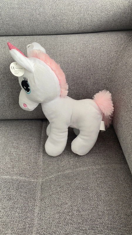 Peluche licorne pour transmettre votre message d'un façon or