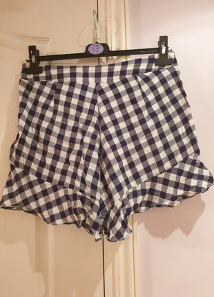 Short à carreaux noir et blanc ourlet effet volant, marque: Eclectic, état: Très bon état, taille: M / 38 / 10, 5,00 €, 5,95 € Protection acheteurs incluse