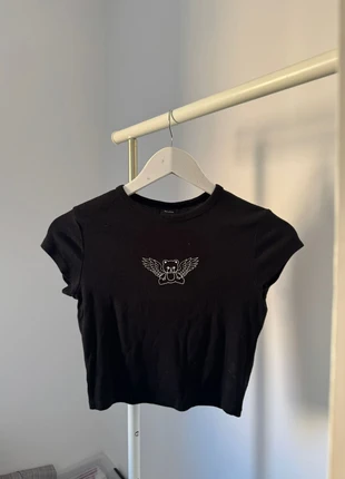 🔥 Crop top negro Y2K con osito alado 🔥, marca: Bershka, estado: Muy bueno, tamaño: S / 36 / 8, 1,99 €, 2,79 € Protección al comprador incluida