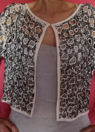 Chaquetilla calada de lentejuelas de Zara. Veste á sequins. , marque: Zara, état: Neuf sans étiquette, taille: M / 38 / 10, 35,00 €, 37,45 € Protection acheteurs incluse