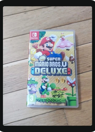 New Super Mario Bros Deluxe sur Nintendo Switch complet fr, estado: Muy bueno, 35,00 €, 37,45 € Protección al comprador incluida
