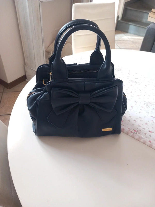 Camomilla sale milano bags