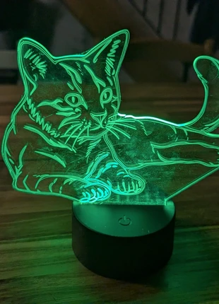 A vendre petit socle avec un chat lumineux, marque: Lumineux, état: Bon état, 5,00 €, 5,95 € Protection acheteurs incluse