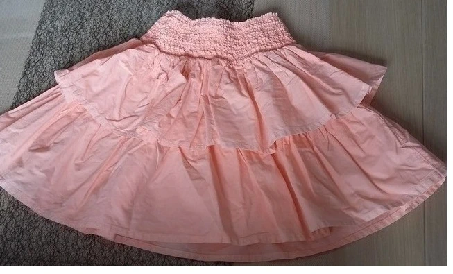 Jupe orange fluo de chez tape à l'oeil 5 ans en très bon état