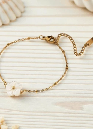 Bracelet doré et fleurs blanches avec perles Acier inoxydable et neuf, marke: Boutique vintage, zustand: Sehr gut, 5,00 €, 5,95 € inklusive Vinted-Käuferschutz