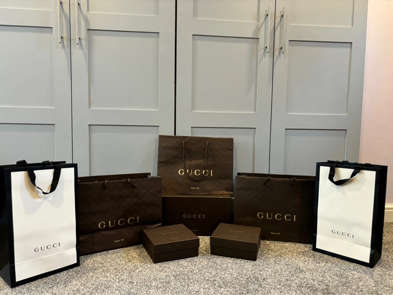 Assorted gucci gift bags and boxes