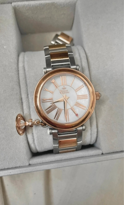 Vivienne Westwood Time Machine rose gold and silver watch with orb | Vinted
