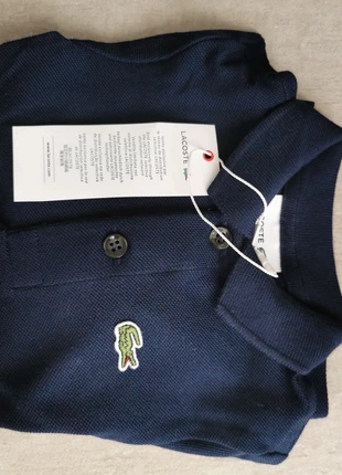 Lacoste Poloshirt langarm , merk: Lacoste, staat: Nieuw met prijskaartje, maat: 12-18 maanden / 80 cm, € 45,00, € 47,95 inclusief Kopersbescherming