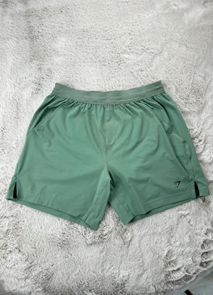 Short GymShark vert clair Flex M, marca: Gymshark, estado: Muito bom, tamanho: M, €23.00, €24.85 inclui Proteção do Comprador Pro