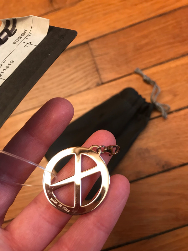 Charm’s pendentif Fendi « X » en métal argenté neuf  3