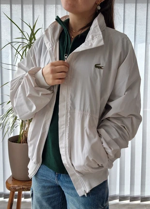 Veste légère imperméable blanche des années 80' Lacoste (1419), marca: Lacoste, estado: Muito bom, tamanho: XL / 42 / 14, €63.00, €66.85 inclui Proteção do Comprador Pro