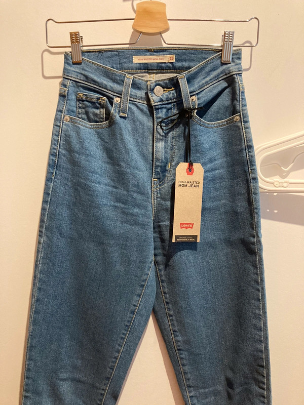 Levi's high waisted tapered jeans in mid-stone wash