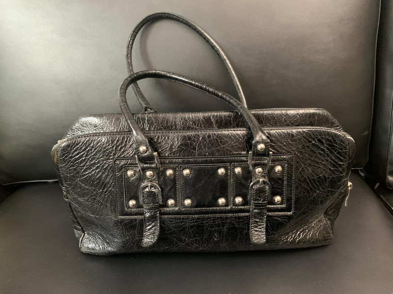 Bolso negro marca hotsell