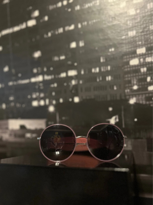 Lunettes de soleil Polaroid, taille 60, bon état 1