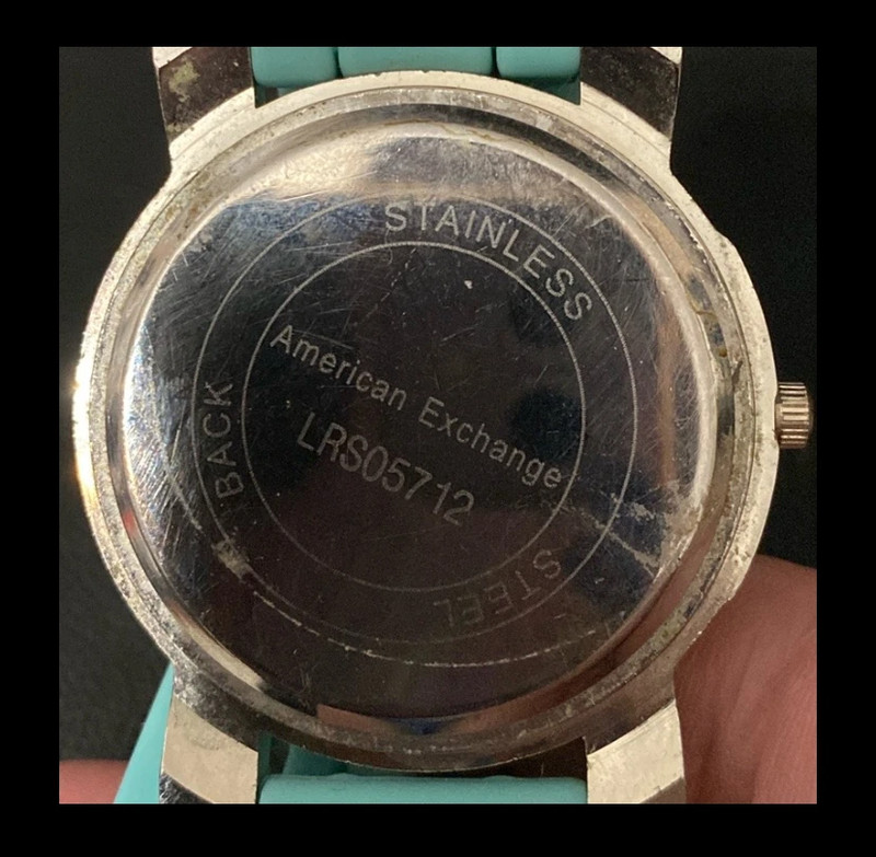 American Exchange Teal silicon band zebra pattern face pattern watch -used 2