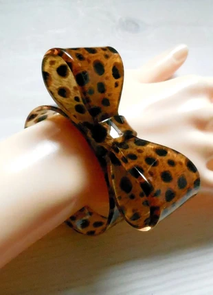 Bracelet en plastique rigide forme noeud papillon - Motif Panthère, brand: sans marque, condizioni: Nuovo senza cartellino, €2.50, €3.33 include la Protezione acquisti