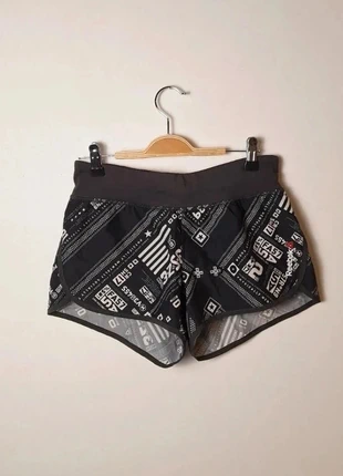 Short Reebok noir à motifs Taille XS culotte intégrée, marque: Reebok, état: Très bon état, taille: XS / 34 / 6, 10,00 €, 11,20 € Protection acheteurs (Pro) incluse