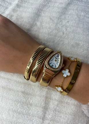 Gold Spiral Watch, merk: Stainless steel, staat: Nieuw met prijskaartje, maat: Universele maat, € 18,00, € 19,60 inclusief Kopersbescherming