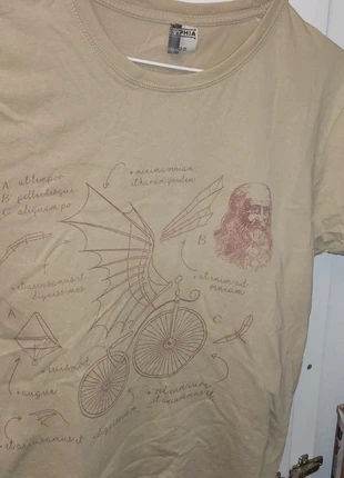 Maglietta beige con disegni Leonardo da Vinci , marque: Da Vinci, état: Très bon état, taille: L, 2,00 €, 2,80 € Protection acheteurs incluse