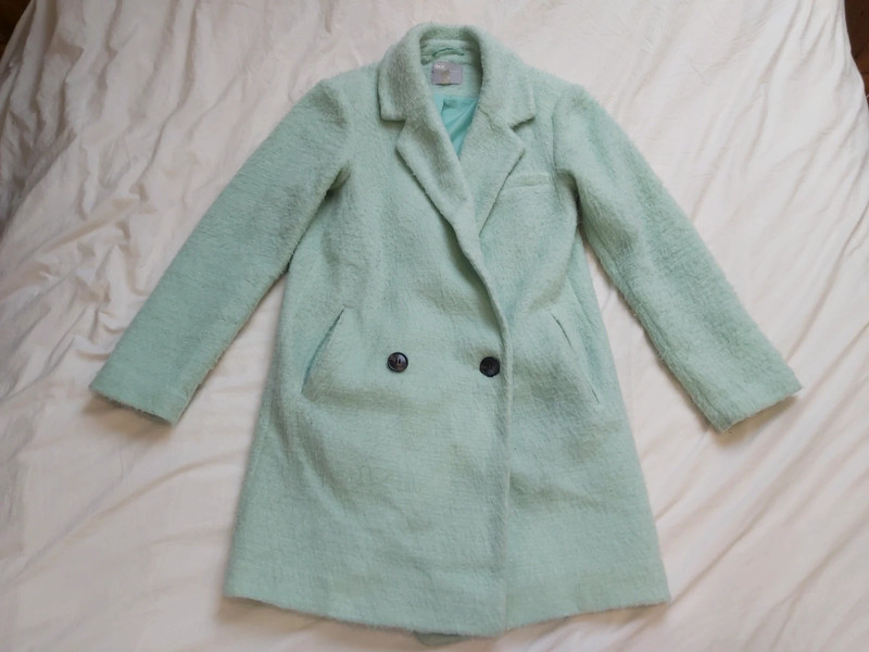 manteau duveteux vert