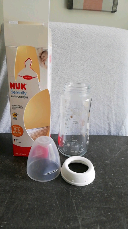 Biberon en verre Nuk 240ml (tétine non comprise) - seconde main/occasion  pour 3.50 € • Petit Kiwi