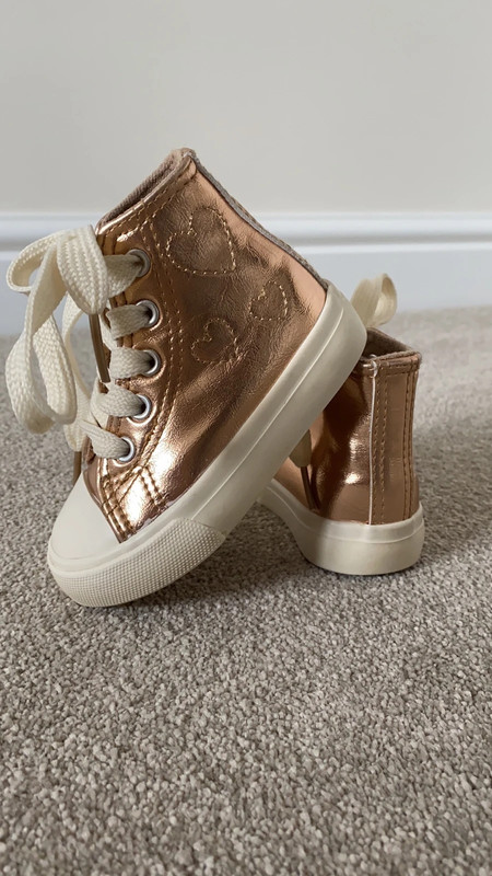 Gold metallic discount high top sneakers