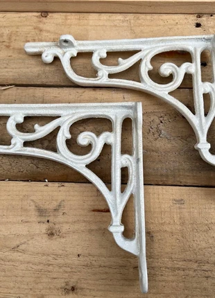 set of two cast-iron wall brackets, marque: This set of two cast-iron wall brackets adds timel, état: Neuf, 25,00 €, 26,95 € Protection acheteurs (Pro) incluse