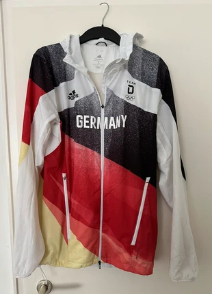 Team D Podiumsjacke Olympia 2021 - Adidas Windbreaker, merk: adidas, staat: Heel goed, maat: S, € 55,00, € 58,45 inclusief Kopersbescherming