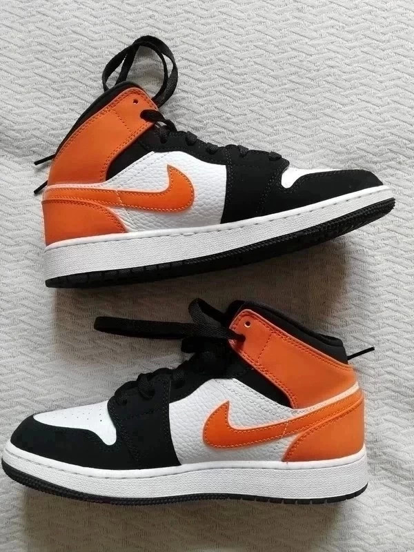 Air Jordan 1 Mid orange et noir