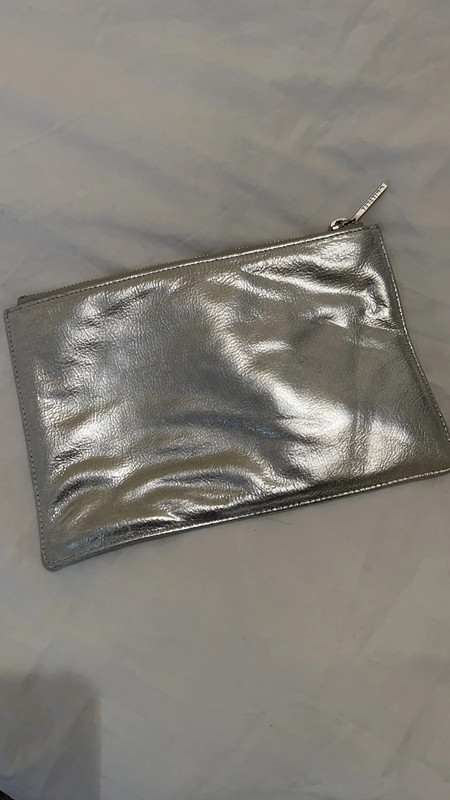 Whistles on sale silver clutch