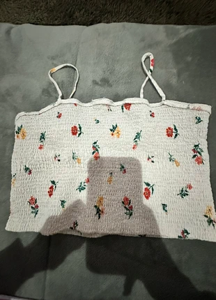 Top florido, marca: Local, estado: Novo sem etiquetas, tamanho: Tamanho único, €1.50, €2.28 inclui Proteção do Comprador