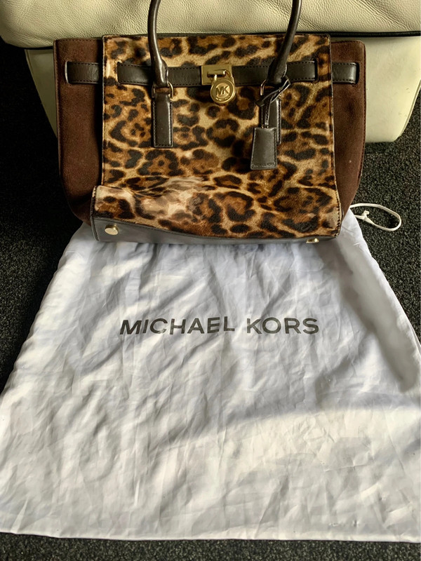 Michael kors animal print bag. Vinted