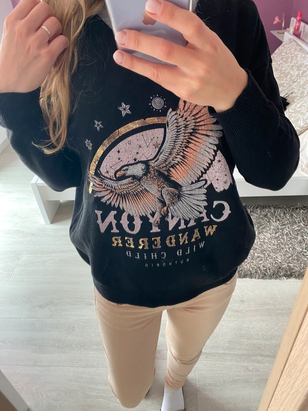 Pull noir chaud aigle