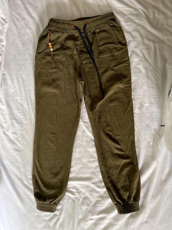 Olive green pants with 2025 side pockets