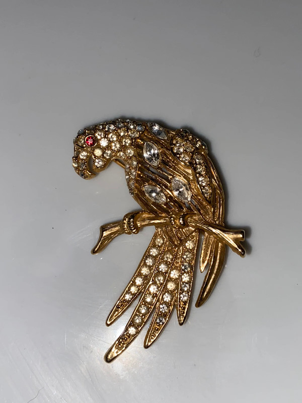 Vintage goldtone metal bird brooch on perch clear snd red faceted stones 2