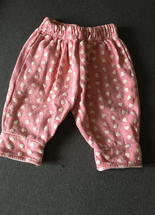 Pantalon rose avec pois blancs  12 mois