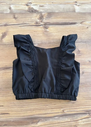 Petit top noir à volants, marque: Loévia, état: Très bon état, taille: 6 ans / 116 cm, 1,00 €, 1,75 € Protection acheteurs incluse