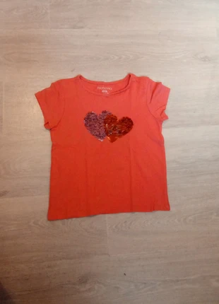Maillot orange avec deux cœurs en paillettes, brand: Intextenso, condizioni: Buone, taglia: 6 anni / 116 cm, €1.00, €1.75 include la Protezione acquisti
