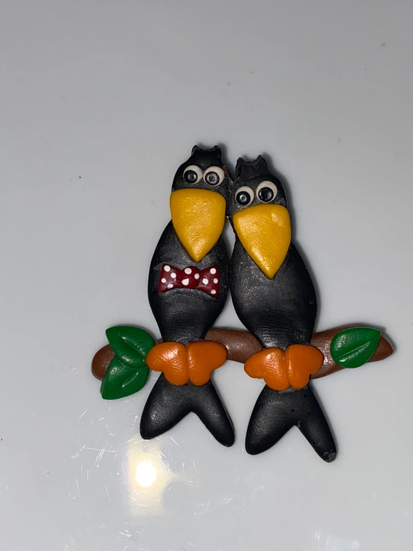Vintage black plastic brooch double birds double toucans on perch black yellow orange 3