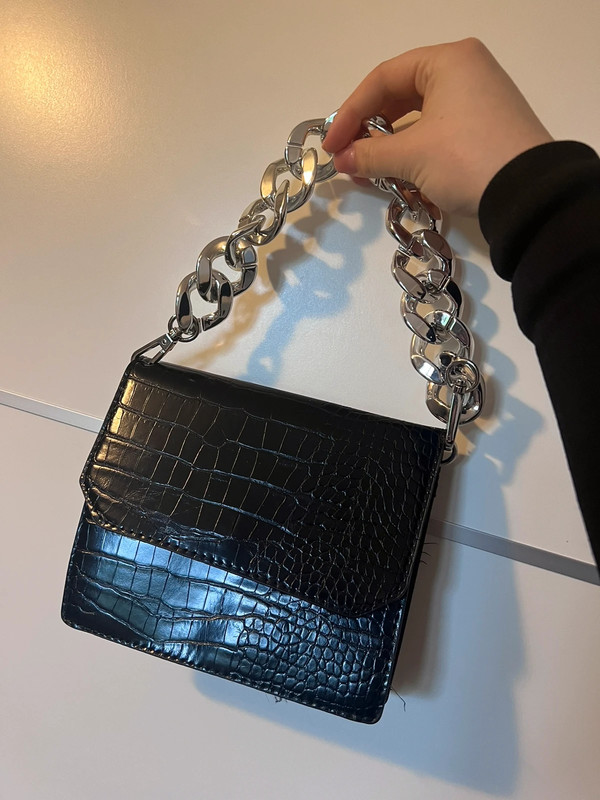 Black bag with silver chain strap